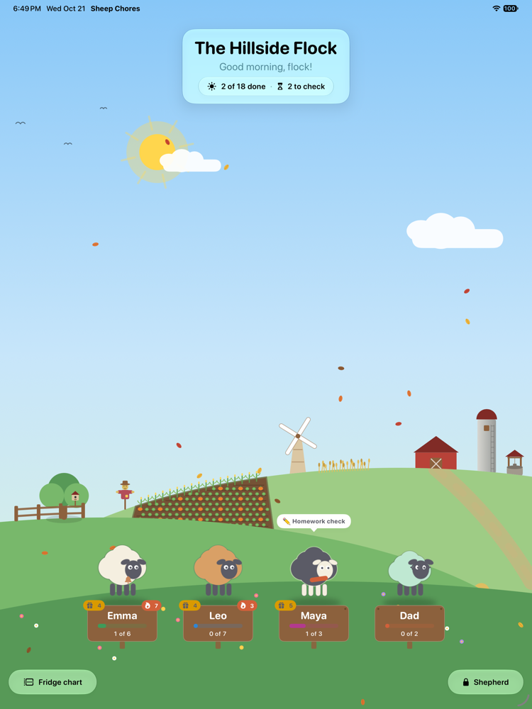 The Pasture on an iPad: four sheep with wooden name signs on rolling hills, a barn, windmill, silo, garden and scarecrow under a daytime sky